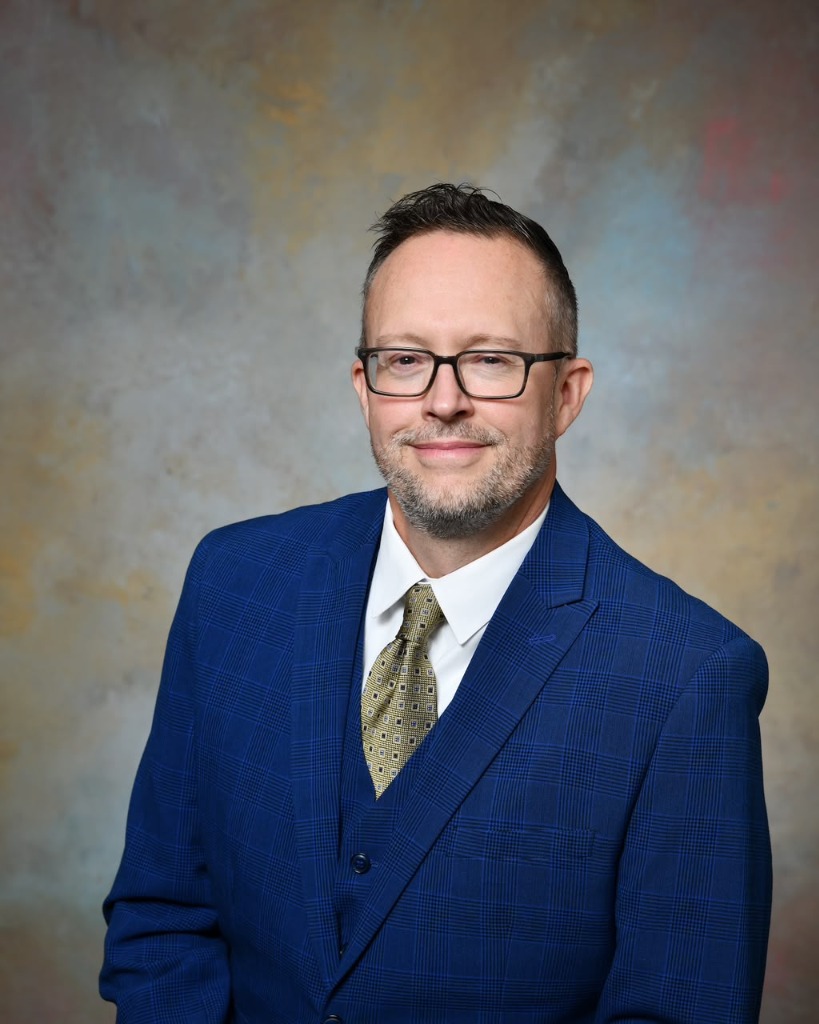 Prof. Damien L. Duchamp, International Board Chair